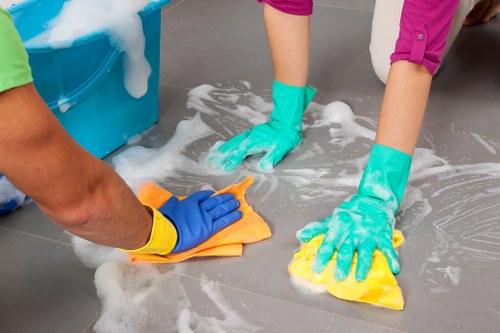 Detailed post-construction dust removal on kitchen surfaces