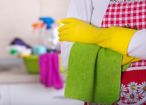 Professional builders cleaning in a Shepherdsbush flat after refurbishment