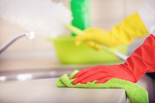 Cleaner working on a domestic oven in Shepherdsbush